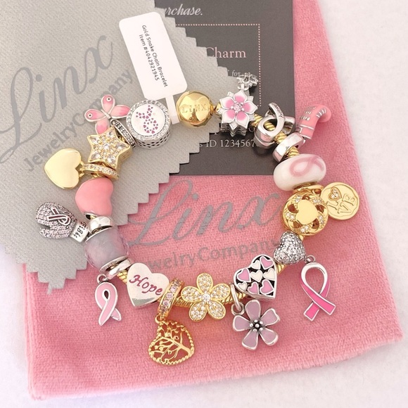 Linx Yellow Gold Bracelet with Pink Breast Cancer Awareness Themed Charms